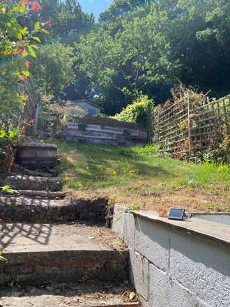 Long narrow garden with both sunny spots and shady areas